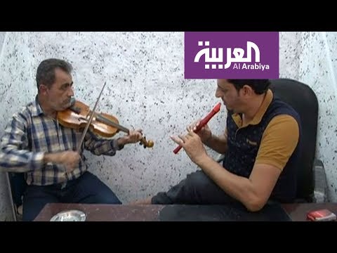 شاهد الموسيقى تعود إلى الموصل وسط ركام المعارك